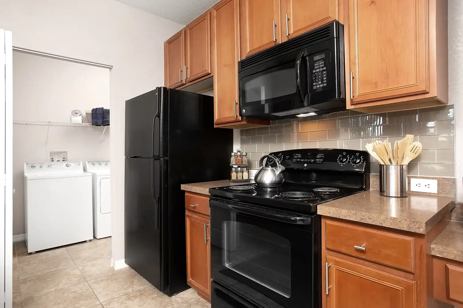 Kitchen with black appliances