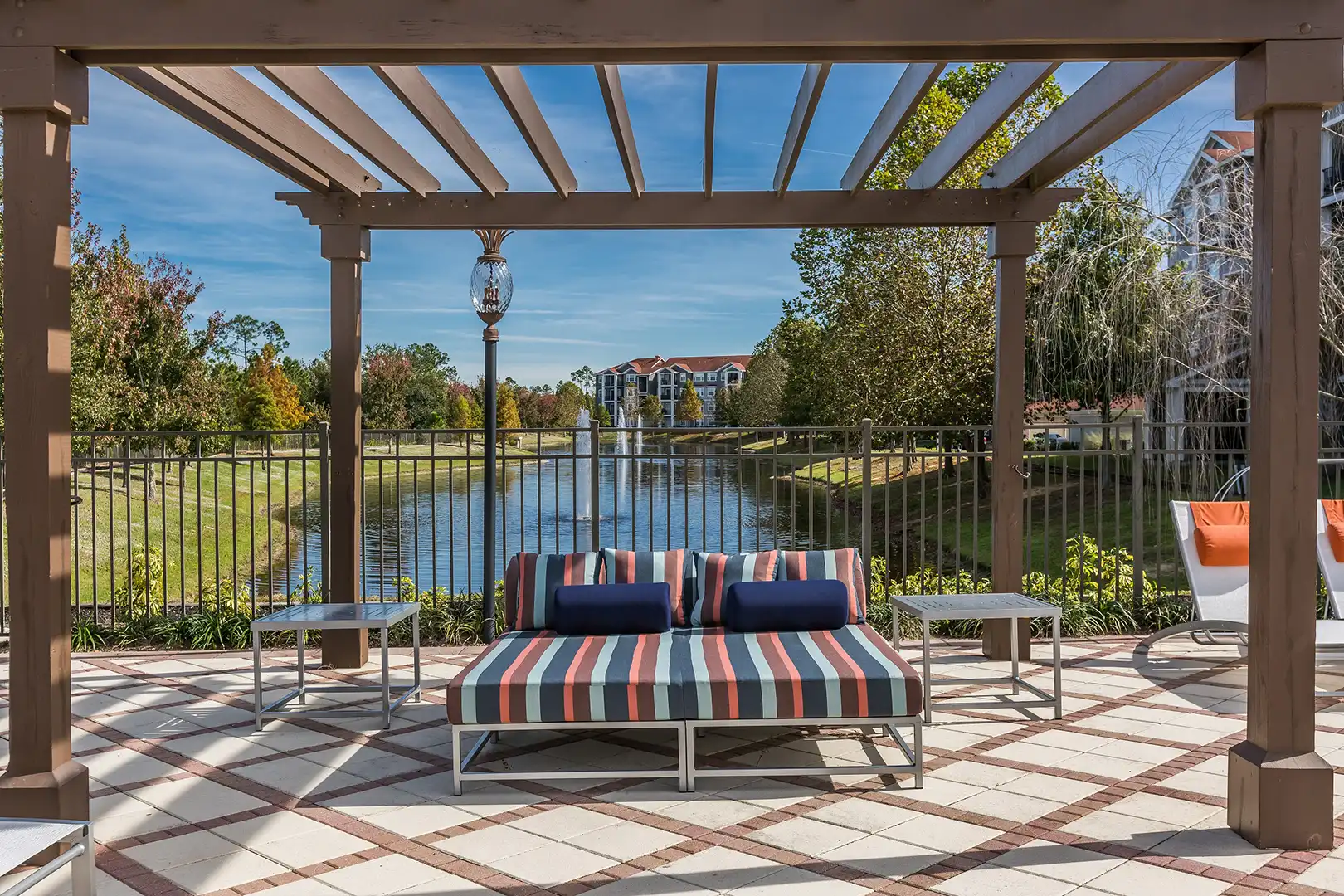 Lounger overlooking community pond